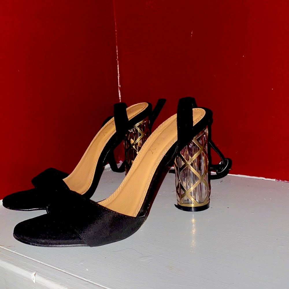 Black and gold heels